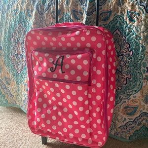 Pink &White polka dot matching suitcase set.